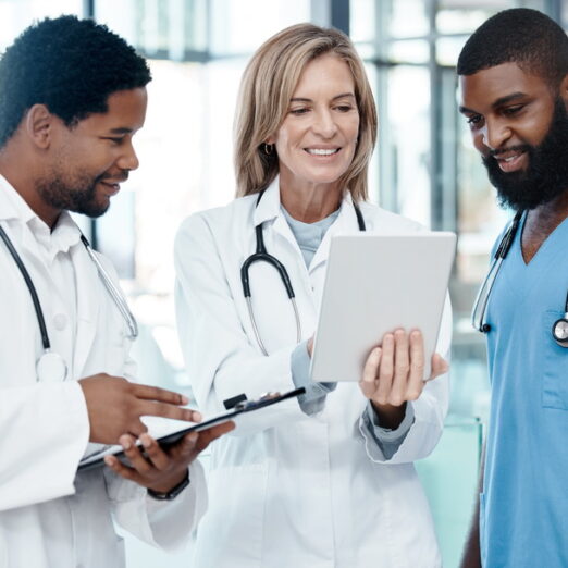 Doctors, meeting and tablet for healthcare planning using information technology for medical develo.